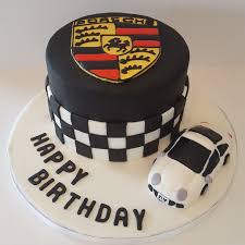 A fluted tube cake easily transforms into a ferocious dragon for a fun birthday cake that will set the party on fire. Porsche Car Cake Birthdaycake Carcake Cake Cakedecorating Cakedesign Mencake Cars Cake Design Car Cake Cake For Husband