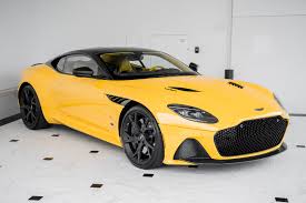 Image result for Sunburst Yellow 2012 Aston Martin