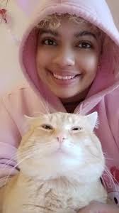 Mid-century fashion shared with a cat