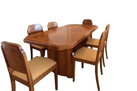 An art deco walnut dining room suite,comprising:a dining table,with canted corners, on twin pedes. 1920s Art Deco Brown Formica Rectangle Dining Table Vinterior