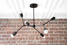 Simply take a few pieces and renew. Modern Chandelier Black Mobile Light Mid Century Lighting Etsy Modern Bedroom Lighting Modern Chandelier Ceiling Light Covers
