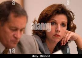 Lynn Turner, who's been accused of murdering her Cobb County Police officer  husband Maurice Glenn Turner by poisoning him with antifreeze, listens to  closing arguments in Cobb Superior Court in Marietta, Ga.,