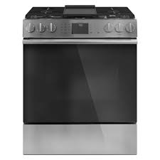 The range top burners are surrounded by a black porcelain drip pan for easy cleaning, and cast iron grates cover the entire top for easy cookware movement. The Best Gas Stoves For Your Kitchen 2021