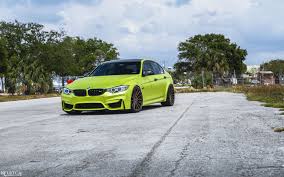 Satin Lime Green Bmw M3 Strikes A Pose With Bronze Wheels Carscoops Bmw M3 Bmw Chevrolet Spark Ls