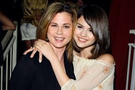 Mandy Teefey Celebrates Daughter Selena Gomez On Instagram Teen Vogue Producer 13 reasons why, living undocumented, broken hearts gallery.