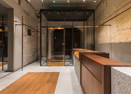 Chinese Studio Neri Hu Has Designed The Interior Of Comme Moi S First Flagship Store Installing Custom Made Metal R Shop Interiors Retail Interior Neri And Hu