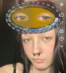 My daughter with her gorgeous Amber eyes. When she's outside in summer they  glow golden.