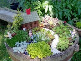 How To Create A Fairy Garden In A Container Fairy Garden Fairy Garden Containers Miniature Fairy Gardens