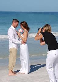 A romantic new destination wedding idea. Simple Beach Weddings Wedding Ideas Tips Florida Beach Wedding Bride Groom Pink Bouquet Florida Beach Wedding Simple Beach Wedding Beach Wedding Attire