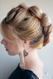 High bun updos /source this is a super smooth big knot hairstyle with braid twist around it. Lovely Braided Updo Hairstyle The Braid Hawk Hairstyles Weekly