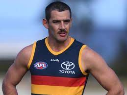 Port adelaide great kane cornes has criticised adelaide veteran taylor walker for not fronting the media to address the findings of an afl investigation into his racial slur. Nl2aesojiy0mam