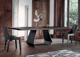 Solid wood's unique dark and light wood grain pattern adds to the natural yet dramatic surface. Bonaldo Amond Solid Wood Dining Table Bonaldo Tables At Go Modern