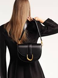 Browse our latest collection of women's bags, shoes and accessories at charles & keith. Black Gabine Saddle Bag Charles Keith Gr