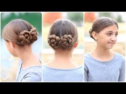 The hunger games hairstyles blue teal orange dyed hair. Prim S Mockingjay Braided Bun Updo Hunger Games Hairstyles Youtube
