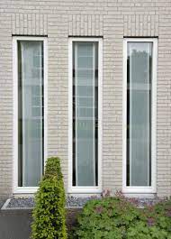 Maybe you would like to learn more about one of these? Three Windows Three Vertical Windows In A Brick Wall Ad Vertical Windows Wall Bric Modern Window Design Modern Windows Exterior Window Glass Design