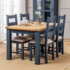 Our collection of tables come in a multitude of sizes, finishes and expressions, making them an ideal fit for dining settings and home offices alike. Westbury Blue Painted Extending Dining Table 4 Dining Chairs Set The Furniture Market