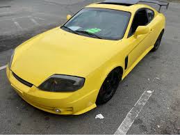 Image result for Sunny Yellow 2004 Tiburon