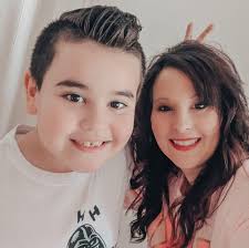 If your home feels a little naked after the holidays, cut a branch and  stick it in a vase. Don't screw it in the wall like I did though. That's a  little