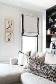 Black And White Roman Shades Drapery Decorating Ideas White Roman Shade With Black Border White Sectional Sofa With Black And Whit Monochromatic Living Room Living Room White White Rooms