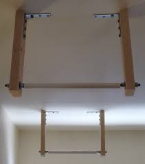 Wood diy garage ceiling storage. How To Store A Ladder On The Garage Ceiling Like A Pro