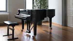 Station the piano board (this is equipment specially used for moving pianos) next to the long side of the piano, set a clean pad on top of the board. Music Box Piano Movers Professional Piano Moving Company In Vancouver And Fraser Valley