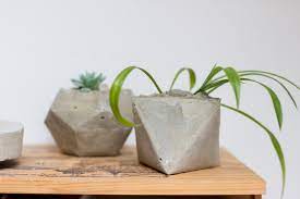 You can also paint them as you desire. How To Craft Stylish Concrete Planters Of All Shapes And Sizes