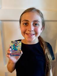 Anora pulled her first ever enchanted out of her first pack of Reign. She  was literally bouncind to the roof and scremaing! If you havent seen, her  main is a Lilo and