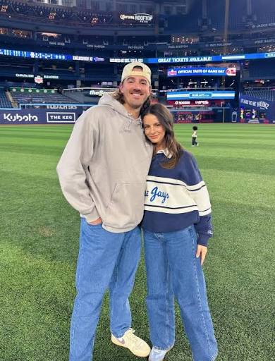 Kevin Gausman sharing a wholesome on-field moment with his wife ❤️⚾️ Family  time hits different after the game 💙