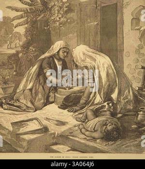 THE FAMINE IN INDIA: WOMEN GRINDING CORN Stock Photo - Alamy