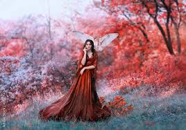 Powerful Autumn Nymph Queen Of Fire And Goddess Of Hot Sun Lady In Long Red Light