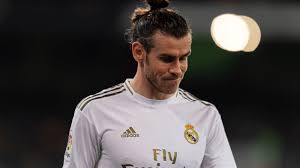 Gareth bale hairstyle with headband and slicked back hair via www.menshairforum.com. Gareth Bale Hair Transplant Estenove Hair Transplant
