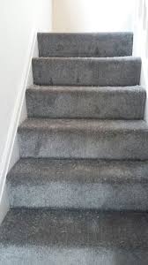 This stairs itself comes with bright steps and dark balustrade. Dark Grey Stairs Carpet For Your Home Fitted In Altrincham Cheshire Grey Carpet Carpet Stairs Grey Stair Carpet