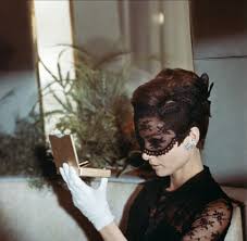 I Want Audrey Hepburn Pulls Off A Lace Veil Across Her Heavily Made Up Eyes Glitter Shadow The Veil Ties With A Ribbon In Style Icon Audrey Audrey Hepburn