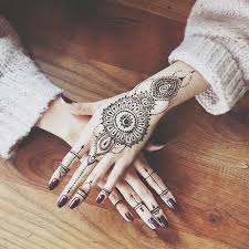 White 'henna' tattoo isn't actually made from henna plant ink, but a mix of surgical adhesive and white body paint. Henna Designs And Art Henna Tattoo Designs Hand Henna Tattoos