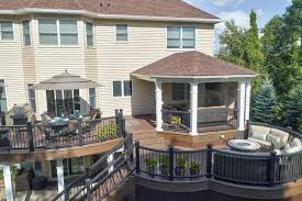 A pergola made from inexpensive treated lumber and then stained can look great and still cost less than manufactured options. Deck Builders And Deck Contractors Amazing Decks