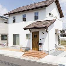 ケース95石張りがアクセントの広々リビングのお家 マイホーム 外観 住宅 外観 家のデザイン