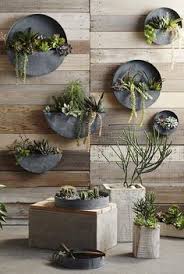 Use even small spaces in your garden or home with this metal circular hanging wall planter. 13 Outdoor Wall Planters Ideas Planters Wall Planter Wall Planters Outdoor