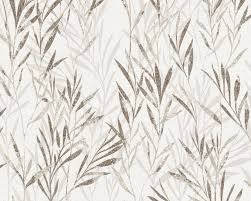 The creamy white background is detailed with spindly branches and wispy leaves inked in. A S Creation Wallpaper Floral Beige Brown Cream 367124