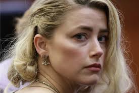 Amber Heard passe un accord avec Johnny Depp - Rolling Stone