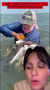 Girl Puts Trout in