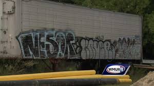 2 Men Linked To Graffiti In Manchester Police Say