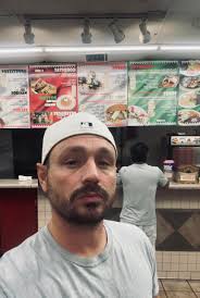 How did Hole in the Wall get its menu translated into English?