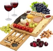 It features two handy trays for holding crackers and other small items as well as a central stage for placing your range of delicious cheeses. 7 Best Cheese Board Sets Of 2021 Foods Guy