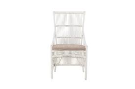 Featuring a curved back, tapered wood legs, and classic spindles, this dining chair is anchored by scandi design elements, but is perfect for modern farmhouse and french country aesthetics as well. Hampton White Rattan Chair Own It Now Pay Later With Zip