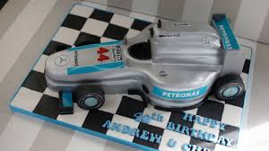 All logos on helmet i hand painted onto fondant. Lewis Hamilton Cake