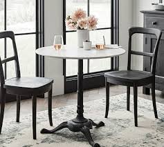 Pub table bistro sets are prefect for a dining nook area or simply the center piece of a small kitchen. Rae Round Marble Pedestal Bistro Dining Table Pottery Barn