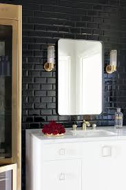 The window pane shower doors are gorgeous and really showcase the beautiful subway tile with. How To Decorate With Black Tile Colour In Tiles