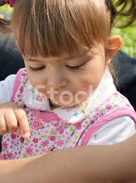Little Girl And Ant Stock Photo