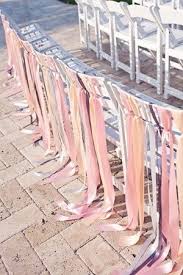 Essentially What The White Resin Chairs Look Like Im Sure We Can Do This Ribbon Look On The B Wedding Chair Decorations Wedding Ceremony Chairs Wedding Chairs