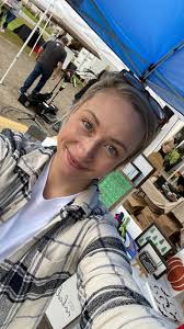 Is the vendor packing up in the rain?